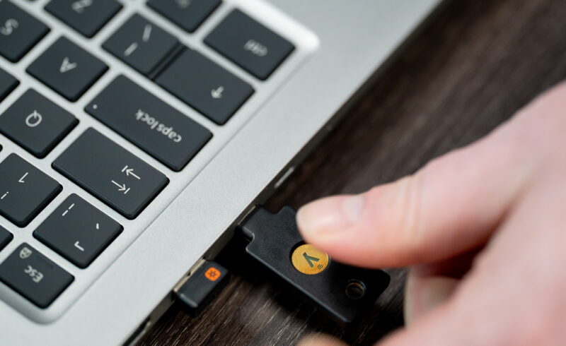 Inserting a passkey into a laptop